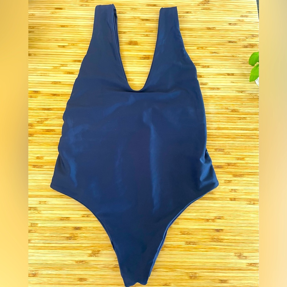 One of a kind deep V cheeky royal blue one-piece